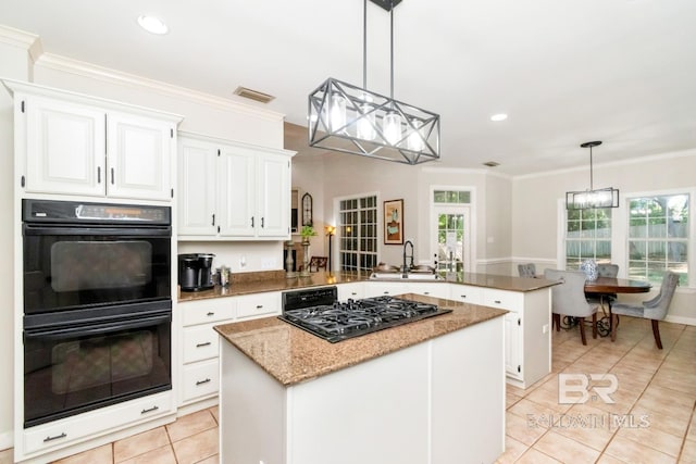 8814 N Dawes Lake Rd, Mobile, AL 36619 - kitchen featuring a sink, a peninsula, light tile patterned flooring, dobule oven black, and cooktop