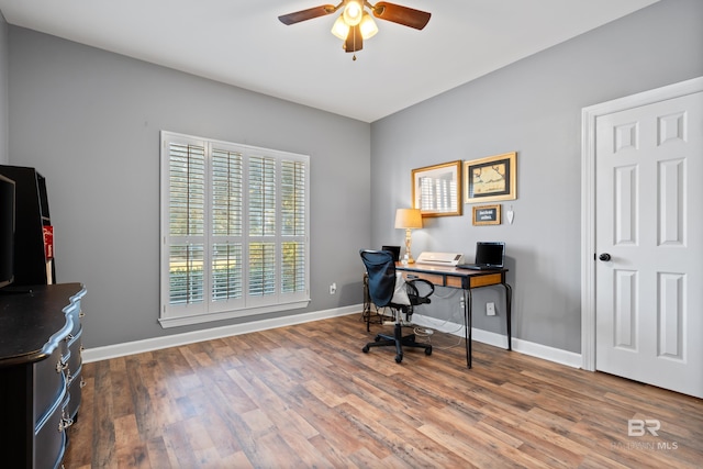 office area with hardwood / wood-style flooring and ceiling fan