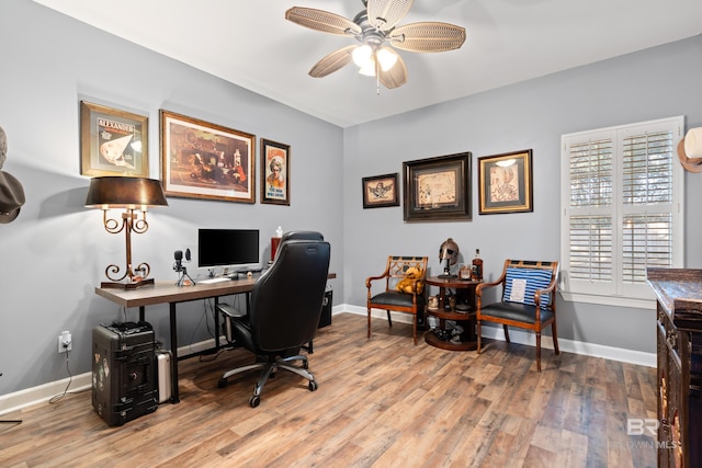 office featuring hardwood / wood-style flooring and ceiling fan