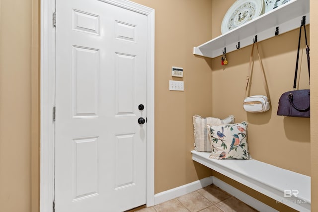 mudroom with light tile patterned floors