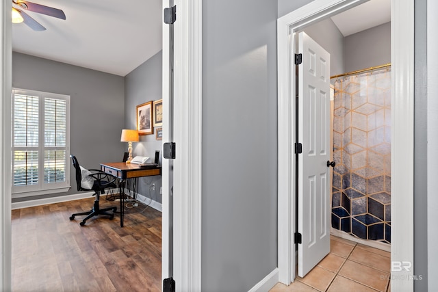 8814 N Dawes Lake Rd, Mobile, AL 36619 - home office with light wood finished floors, baseboards, and ceiling fan