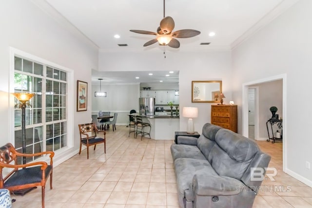 8814 N Dawes Lake Rd, Mobile, AL 36619 - living area with crown molding, a ceiling fan, light tile patterned flooring, and recessed lighting