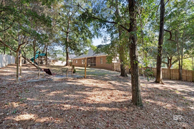 view of yard featuring a playground