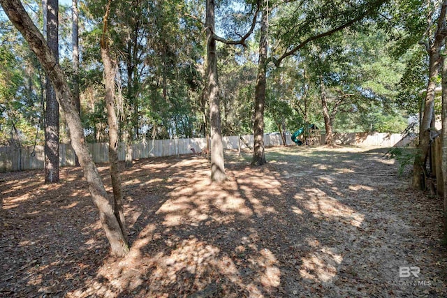 8814 N Dawes Lake Rd, Mobile, AL 36619 - view of yard featuring fence