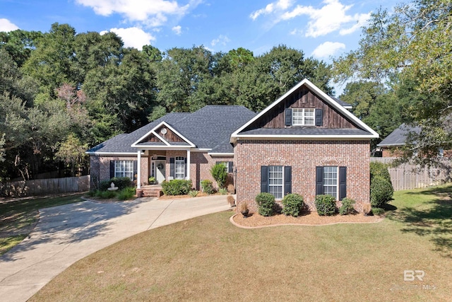 craftsman house with a front lawn