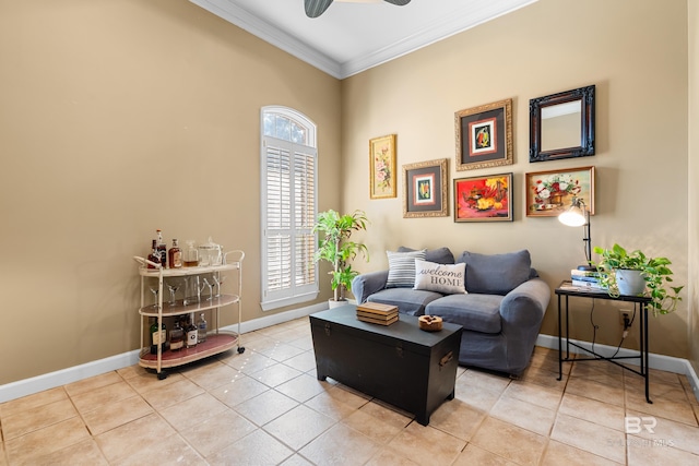 sitting room featuring ornamental molding, tile patterned floors, and ceiling fan