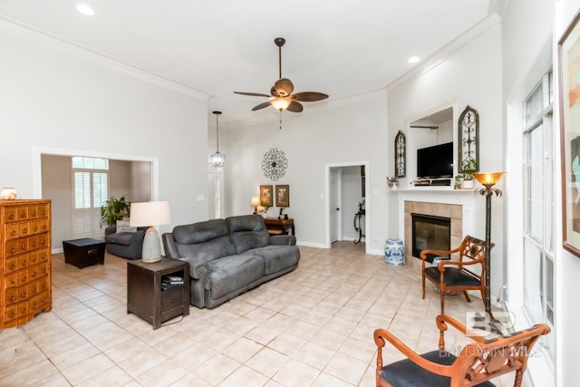 8814 N Dawes Lake Rd, Mobile, AL 36619 - living area featuring a ceiling fan, a fireplace, light tile patterned flooring, ornamental molding, and recessed lighting