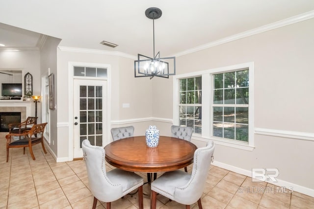 8814 N Dawes Lake Rd, Mobile, AL 36619 - dining space with light tile patterned floors, baseboards, an inviting chandelier, and crown molding
