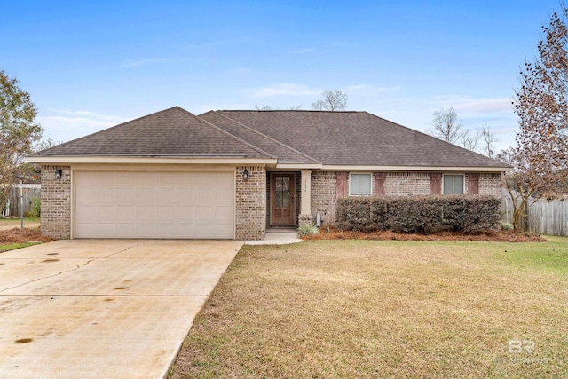 ranch-style house with a front yard and a garage