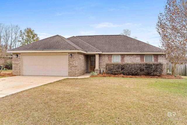 ranch-style house with a front yard and a garage