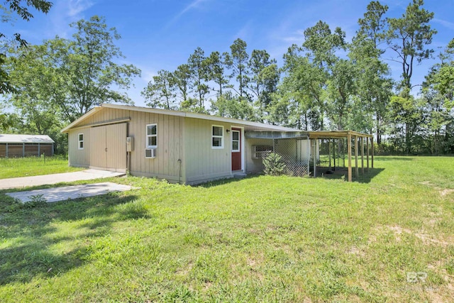 18657 County Road 12, Foley, AL 36535 - rear view of property featuring a yard