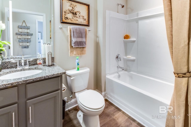 11547 Thistledown Loop, Spanish Fort, AL 36527 - full bath with toilet, vanity, shower / bathtub combination, and wood finished floors