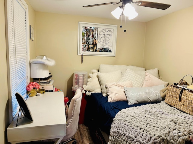 bedroom featuring ceiling fan and hardwood / wood-style flooring