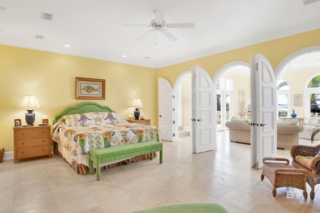 tiled bedroom with ceiling fan