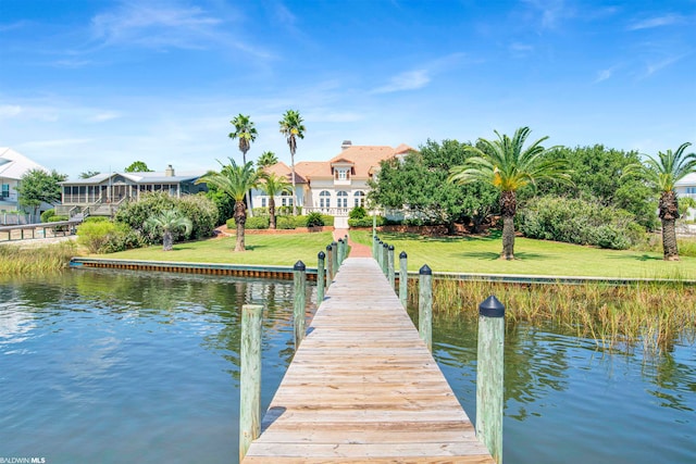 dock area featuring a water view