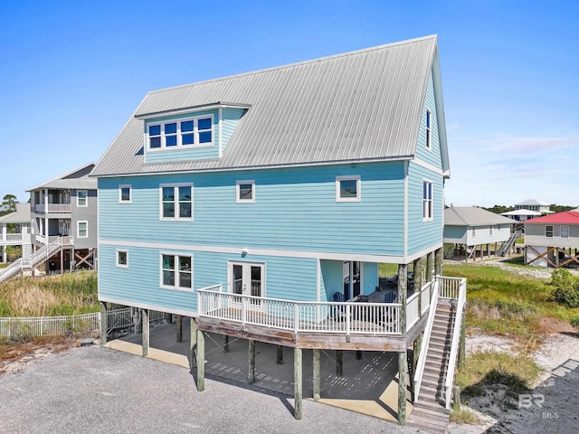 rear view of house with a carport