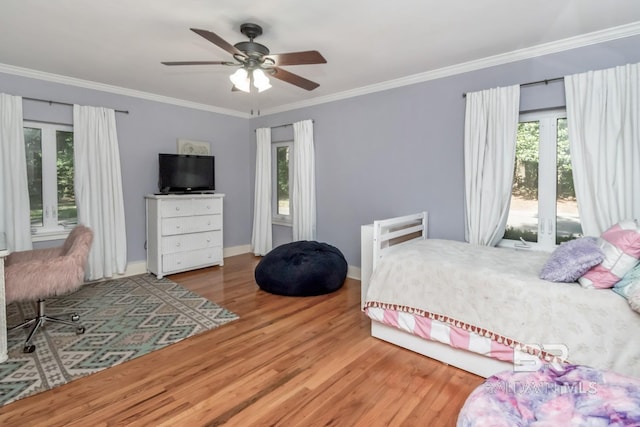306 Thornton Pl, Mobile, AL 36609 - bedroom with wood finished floors, ornamental molding, a ceiling fan, and baseboards
