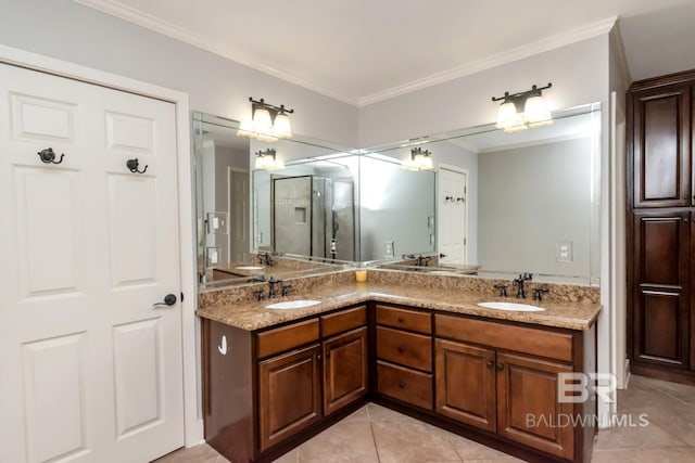 306 Thornton Pl, Mobile, AL 36609 - full bath featuring tile patterned flooring, double vanity, ornamental molding, and a shower with door
