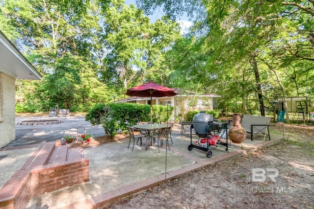 306 Thornton Pl, Mobile, AL 36609 - view of patio featuring a grill
