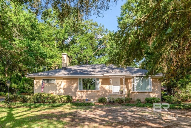 306 Thornton Pl, Mobile, AL 36609 - single story home with brick siding and a chimney