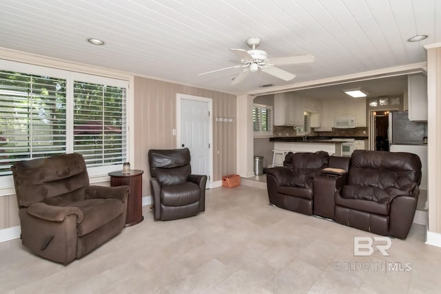 306 Thornton Pl, Mobile, AL 36609 - living room with ceiling fan, ornamental molding, wood ceiling, and baseboards
