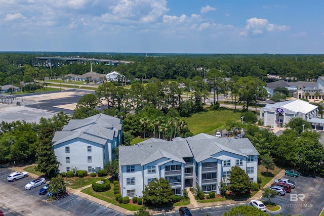 birds eye view of property with a residential view