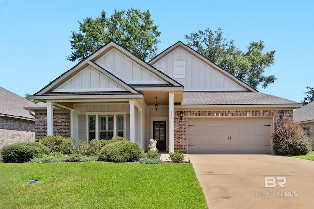 view of front facade featuring a garage and a front lawn