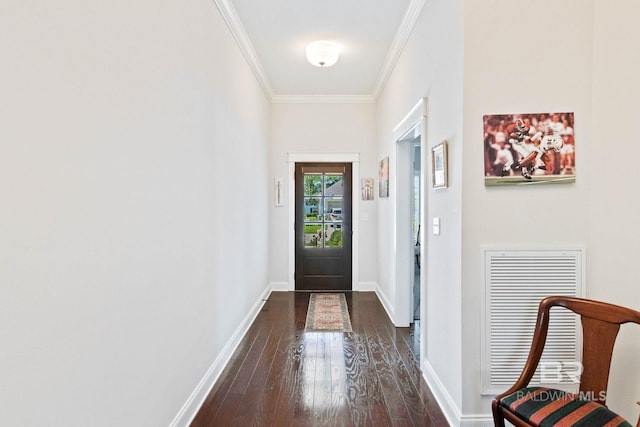 doorway to outside featuring dark hardwood / wood-style flooring and ornamental molding