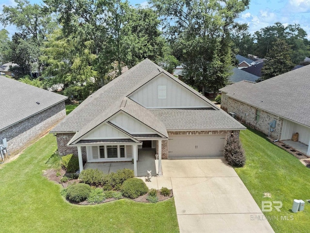 view of front facade with a front lawn and a garage