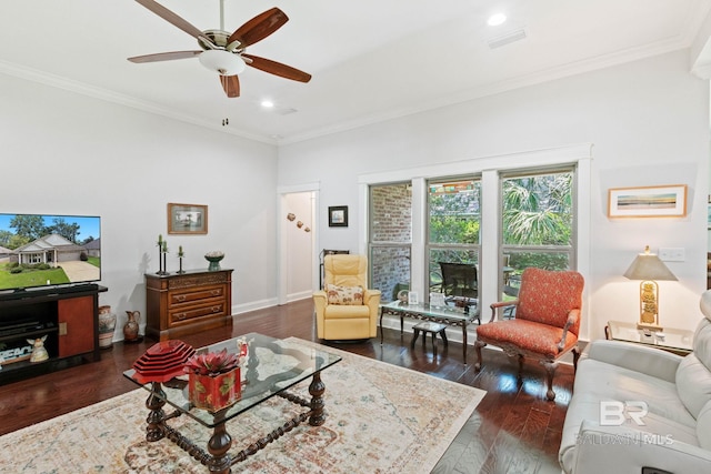 living room featuring crown molding, ceiling fan, and dark wood-type flooring