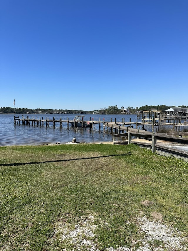 9312 Bay Pines Rd, Elberta, AL 36530 - dock with a water view and a lawn
