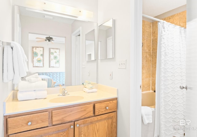 bathroom with ceiling fan, vanity, and a shower with shower curtain