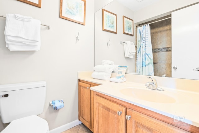 bathroom with toilet, vanity, tile patterned flooring, and a shower with shower curtain