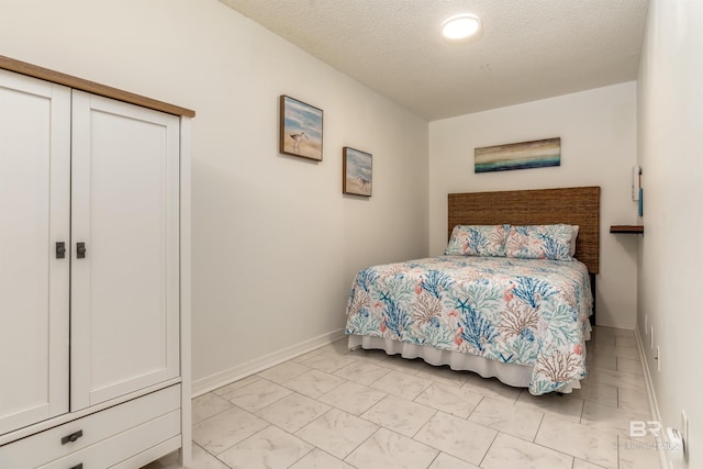 bedroom with a textured ceiling