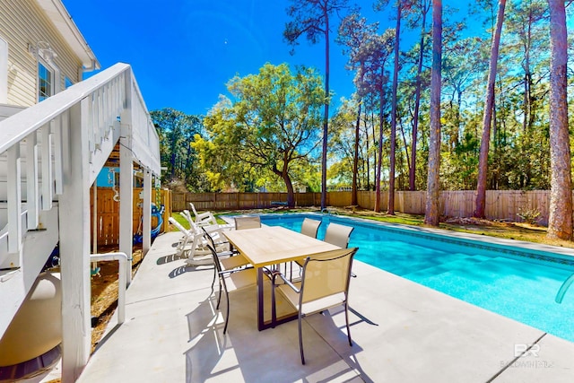 view of pool featuring a patio area