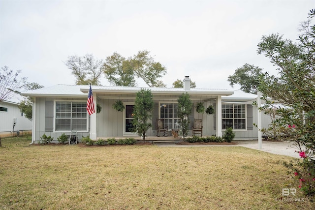 ranch-style house with a front yard