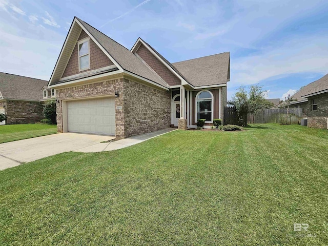 view of front facade featuring concrete driveway, brick siding, fence, and a front lawn