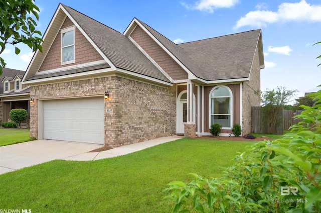 view of front of property with a garage, a front yard, brick siding, and fence