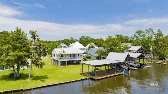 view of dock featuring a water view and a lawn