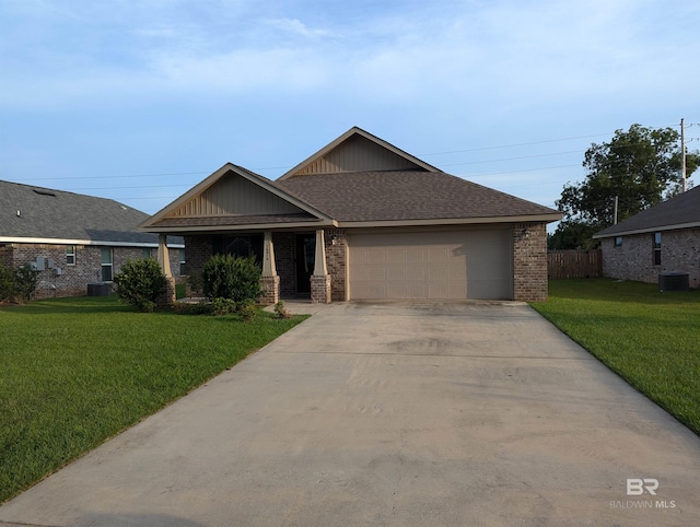 view of front of property featuring a garage, brick siding, fence, concrete driveway, and a front lawn