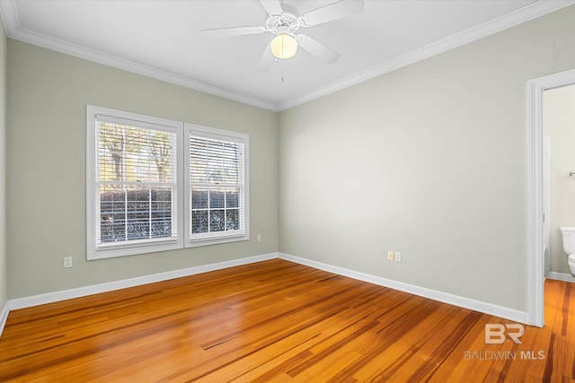 unfurnished room with ceiling fan, light hardwood / wood-style floors, and ornamental molding