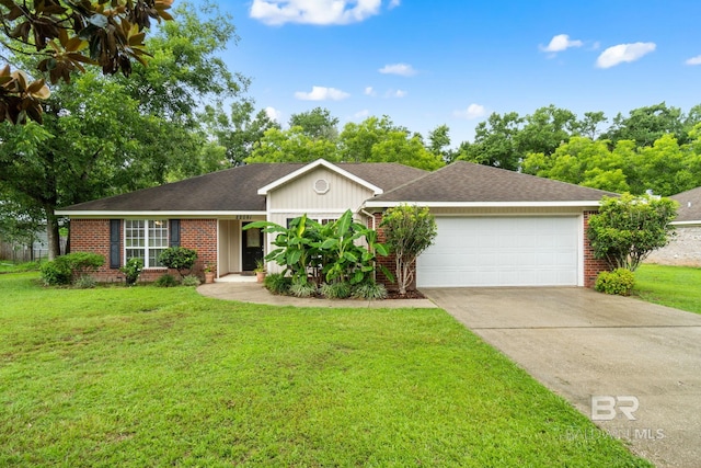 22091 Pecan Loop, Silverhill, AL 36576 - ranch-style house featuring brick siding, an attached garage, driveway, and a front yard