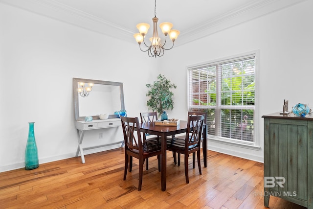 22091 Pecan Loop, Silverhill, AL 36576 - dining room featuring a chandelier, ornamental molding, and light wood-style floors