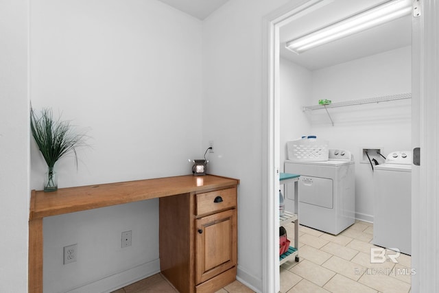 22091 Pecan Loop, Silverhill, AL 36576 - laundry area with washer and dryer and light tile patterned floors