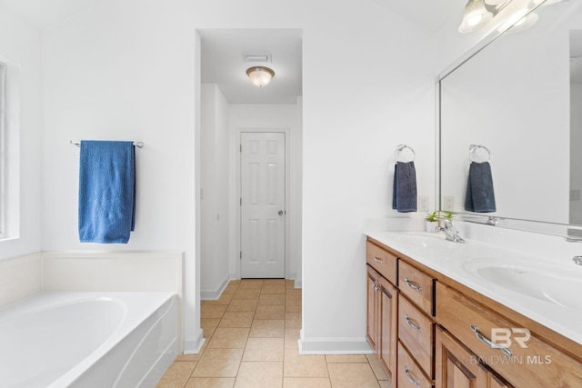 22091 Pecan Loop, Silverhill, AL 36576 - bathroom featuring double vanity, a garden tub, and tile patterned flooring