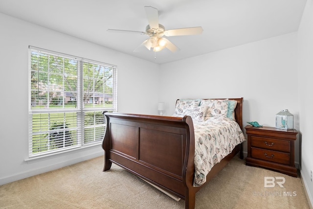 22091 Pecan Loop, Silverhill, AL 36576 - bedroom featuring light carpet and ceiling fan