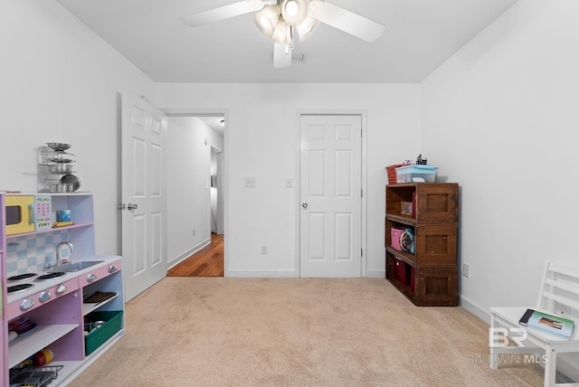 22091 Pecan Loop, Silverhill, AL 36576 - bedroom with carpet and ceiling fan