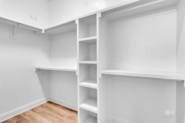 23901 Cypress Xing, Orange Beach, AL 36561 - spacious closet featuring wood finished floors