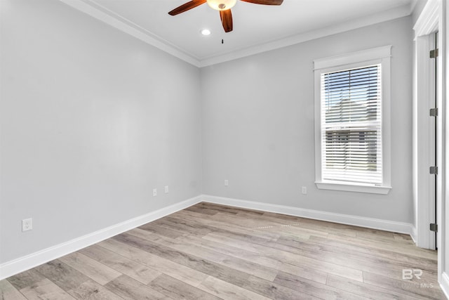 23901 Cypress Xing, Orange Beach, AL 36561 - spare room with a ceiling fan, light wood-style floors, crown molding, and baseboards