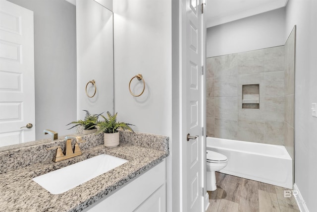 23901 Cypress Xing, Orange Beach, AL 36561 - bathroom with  shower combination, toilet, vanity, and wood finished floors